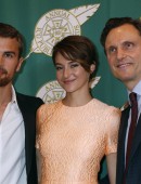 Cast members James, Woodley and Goldwyn of the new film "Divergent" pose at the 51st annual Publicists Guild Awards in Beverly Hills, California