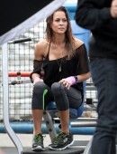 Brooke Burke-Charvet shows off her toned figure while shooting a new Sketchers advertisement at an outdoor gym in Los Angeles