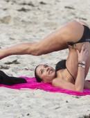 EXCLUSIVE: Italian celebrity Federica Torti does yoga in her bikini on the beach in Miami, Florida