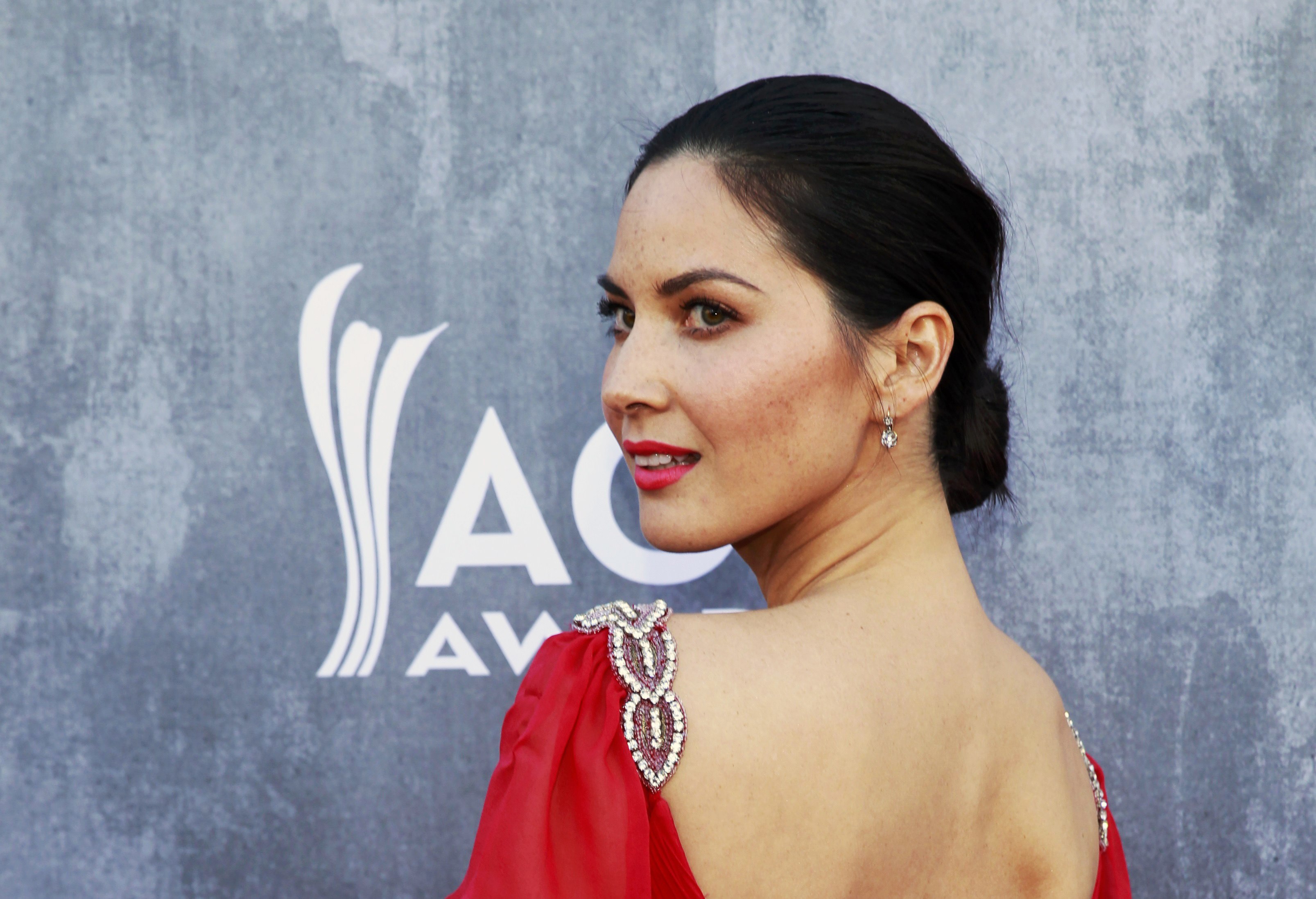 Olivia Munn arrives at the 49th Annual Academy of Country Music Awards in Las Vegas