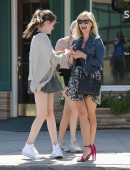 Reese Witherspoon poses for a selfie with some young fans