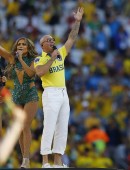 Singers Pitbull, Jennifer Lopez and Claudia Leitte perform during the 2014 World Cup opening ceremony at the Corinthians arena in Sao Paulo