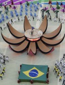Claudia Leitte, Jennifer Lopez and Pitbull perform during the 2014 World Cup opening ceremony at the Corinthians arena in Sao Paulo