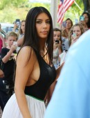 Kim Kardashian showing massive sideboob during lunch with Kourtney