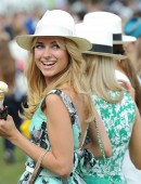 Kimberley Garner is seen enjoying the sunshine at Hurlingham Park in London
