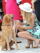 Kimberley Garner is seen enjoying the sunshine at Hurlingham Park in London