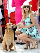 Kimberley Garner is seen enjoying the sunshine at Hurlingham Park in London
