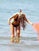 EXCLUSIVE: Laura Barriales on the beach with a boyfriend