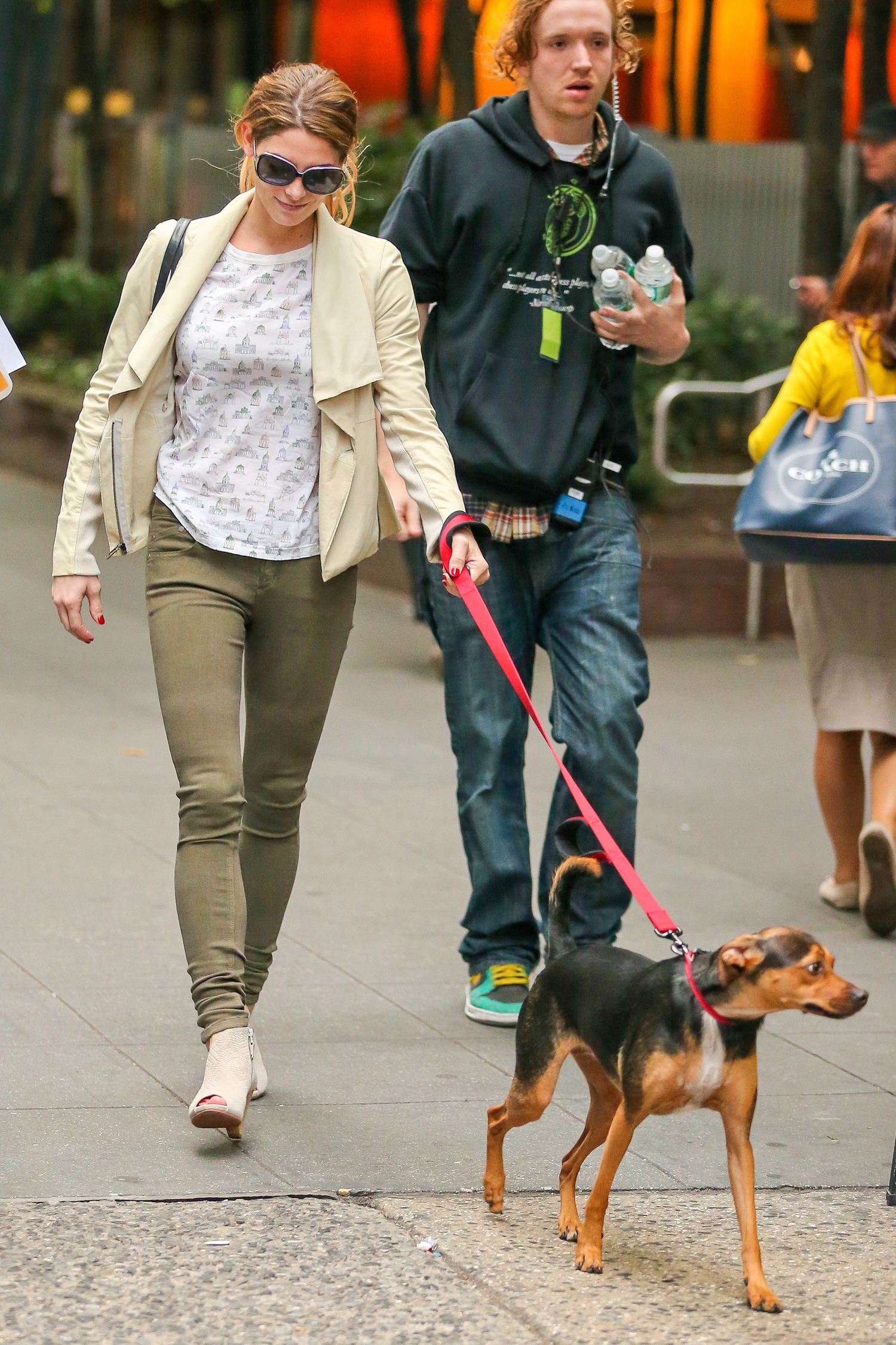 Ashley Greene walks her dog while on break from filming "Urge"