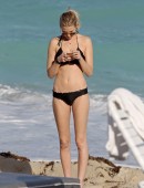 EXCLUSIVE: Whitney Port wears a black bikini to the beach with her fiance Tim Rosenman in Miami