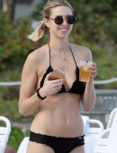 EXCLUSIVE: Whitney Port wears a black bikini to the beach with her fiance Tim Rosenman in Miami