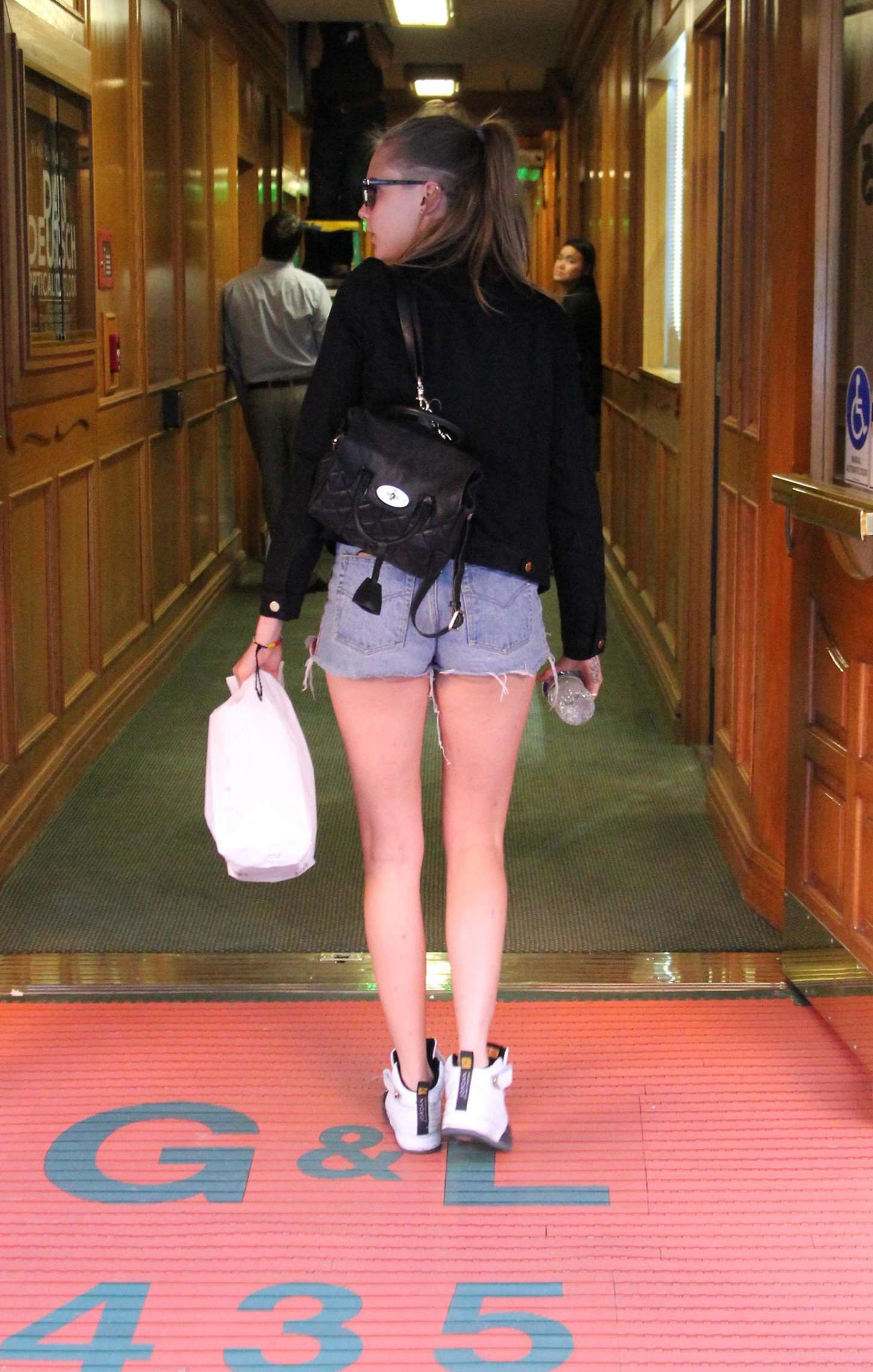 Cara-Delevingne-in-Shorts-6
