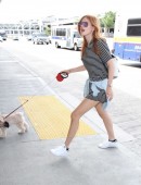 Bella-Thorne-Leggy-at-LAX-with-her-Dog-2
