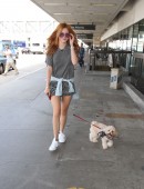 Bella-Thorne-Leggy-at-LAX-with-her-Dog-3