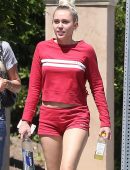 Miley-Cyrus-Leggy-in-Red-Shorts-7