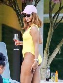 Rihanna-in-Yellow-Swimsuit-17