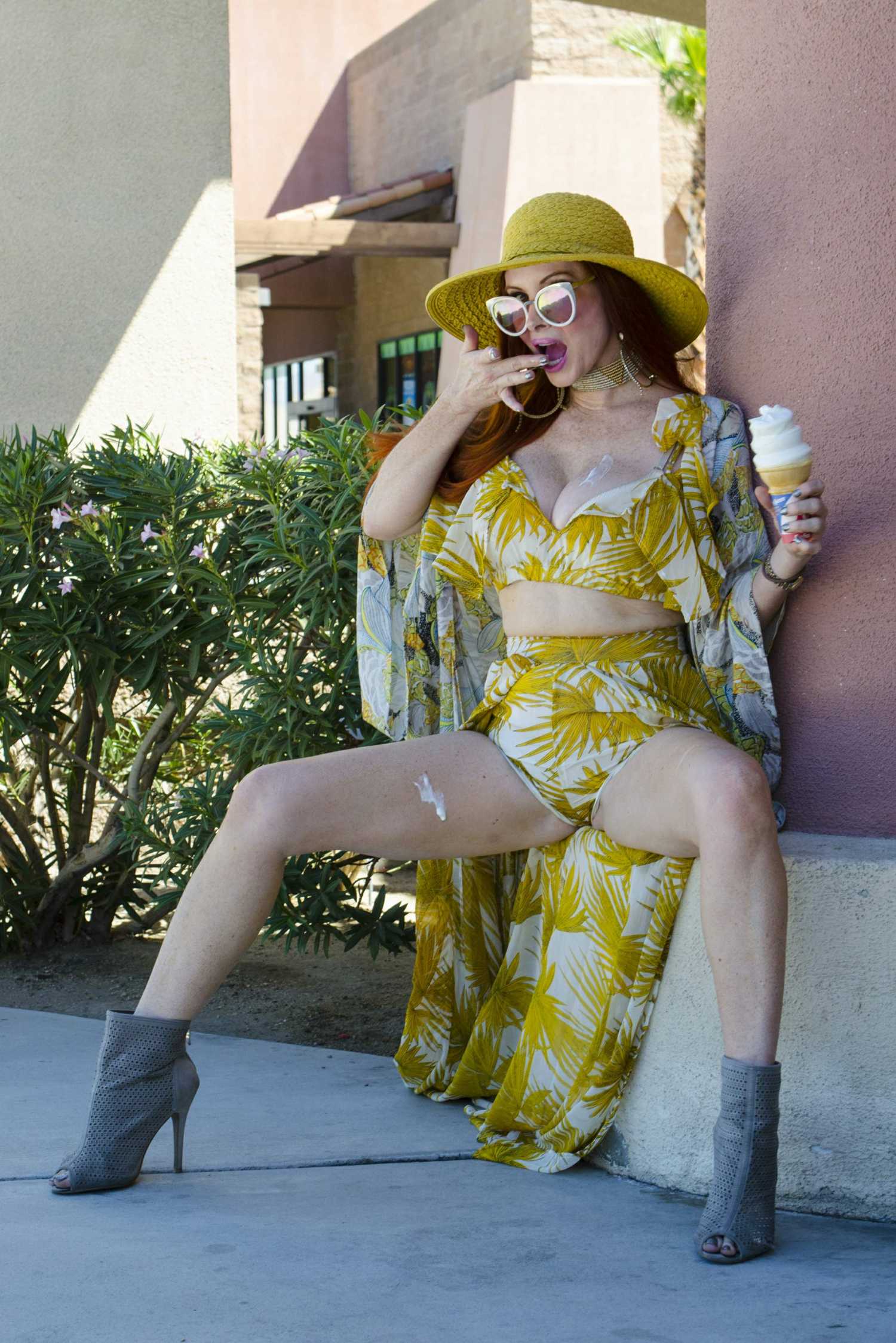 phoebe-price-enjoying-a-creamy-treat-outside-of-dairy-queen-in-palm-springs-5