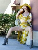 phoebe-price-enjoying-a-creamy-treat-outside-of-dairy-queen-in-palm-springs-6