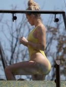 Khloe-Kardashian-in-Yellow-Swimsuit-9