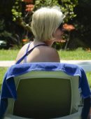 Denise van Outen in Swimsuit at Poolside in Marbella