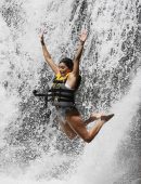 Eva Longoria in Swimsuit under a Fountain in Hawaii