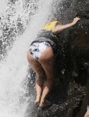 Eva Longoria in Swimsuit under a Fountain in Hawaii