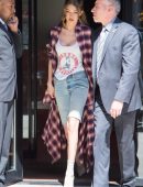 Gigi Hadid Leaving a Building, with an Escort, in New York City