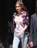 Gigi Hadid Leaving a Building, with an Escort, in New York City