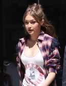 Gigi Hadid Leaving a Building, with an Escort, in New York City