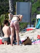 Ireland Baldwin in Black Thong G-string Bikini at a Beach in Malibu