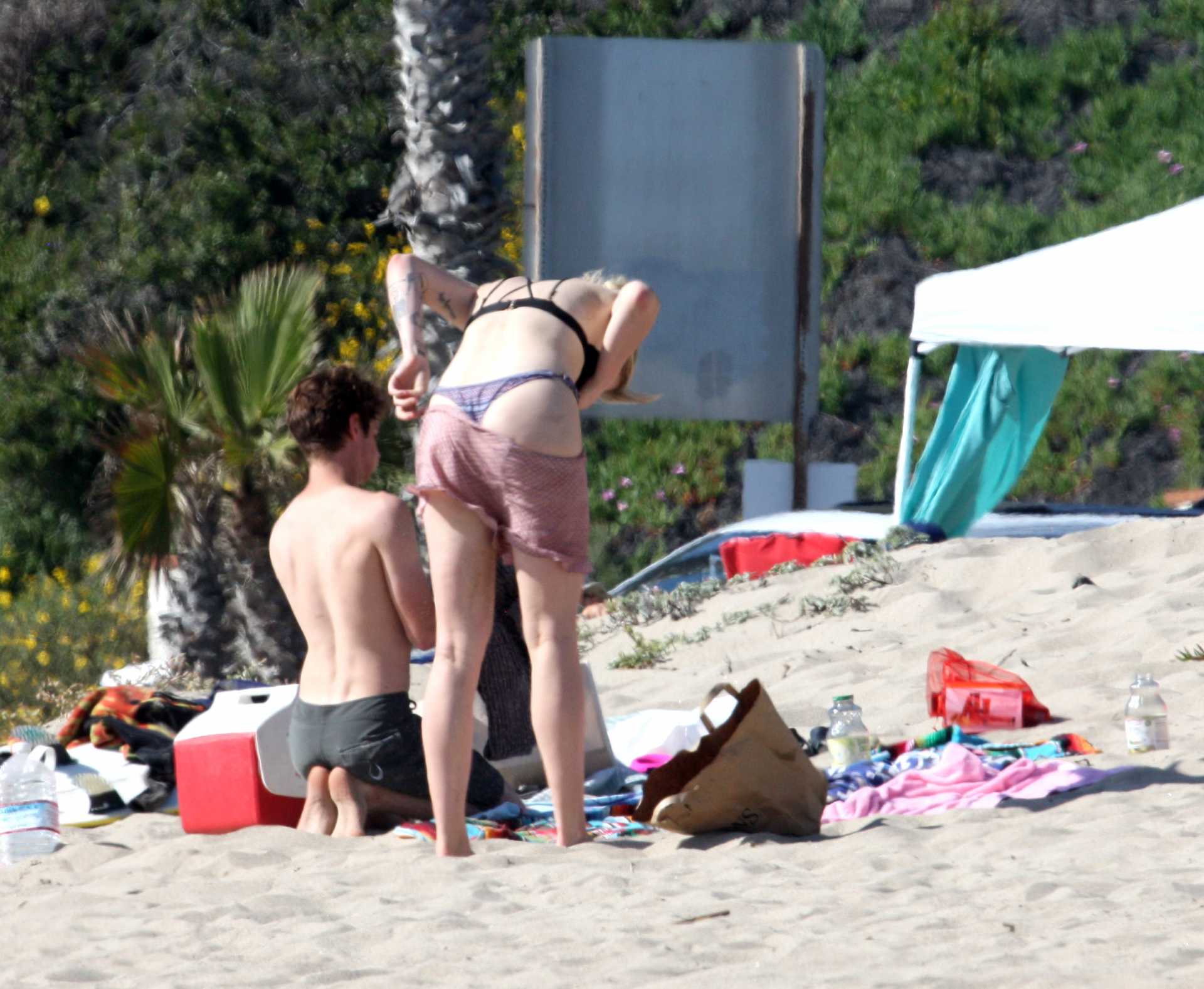 Ireland Baldwin in Black Thong G-string Bikini at a Beach in Malibu