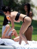 Kim-Kardashian-and-Kourtney-Kardashian-830