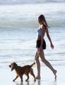 Kimberley Garner Taking her Dog Sasha for a Walk on the Beach in Santa Monica