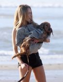 Kimberley Garner Taking her Dog Sasha for a Walk on the Beach in Santa Monica
