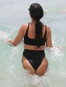 Kourtney Kardashian in Black Bikini on the Beach in Miami