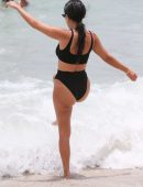 Kourtney Kardashian in Black Bikini on the Beach in Miami