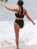 Kourtney Kardashian in Black Bikini on the Beach in Miami
