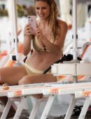 Michelle Hunziker Snorkeling on the Beach in Varigotti
