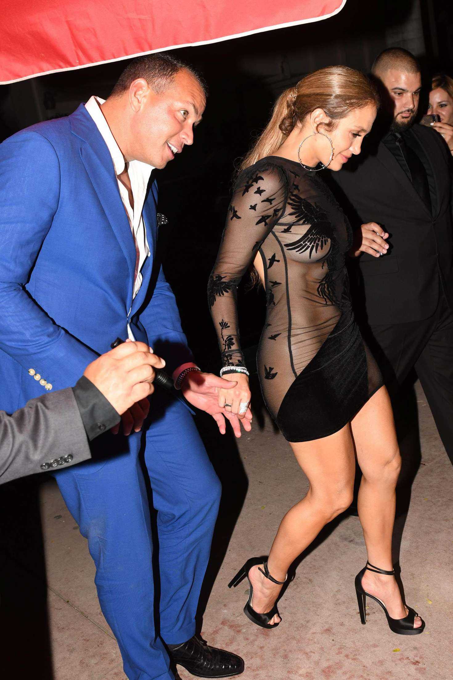 Jennifer Lopez Leggy in Short See-Through Dress at Her Birthday Party in Miami