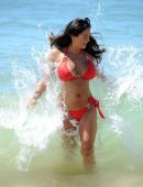 Casey Batchelor in Red Bikini at a Beach in Cyprus