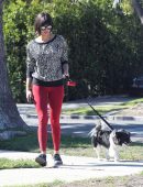 Nina Dobrev in Red Tights walking Dog Maverick in LA