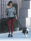 Nina Dobrev in Red Tights walking Dog Maverick in LA