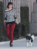 Nina Dobrev in Red Tights walking Dog Maverick in LA
