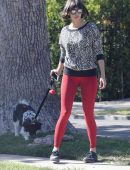 Nina Dobrev in Red Tights walking Dog Maverick in LA