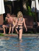 Sarah Harding in Black Bikini at a Pool in Dubai