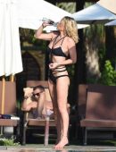 Sarah Harding in Black Bikini at a Pool in Dubai