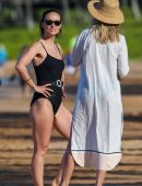 Olivia Wilde in Black Swimsuit Surfing in Hawaii