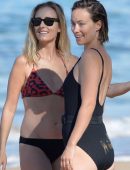 Olivia Wilde in Black Swimsuit Surfing in Hawaii