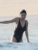 Selena Gomez in Black Swimsuit at the Beach in Cabo