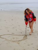 Blanca Blanco Photoshoot in a Red Racing Jacket on a Malibu Beach